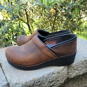 DANSKO Brown and Black Leather Mules with Platform Sole